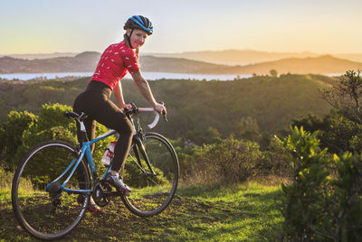 Young woman with bicycle