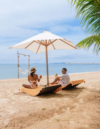 Deck chairs on beach