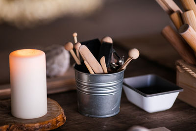 Close-up of paintbrushes on table