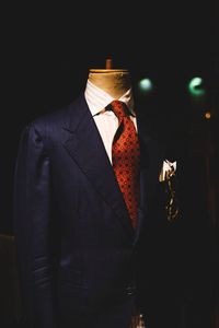Mannequin with suit in clothing store