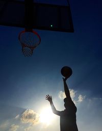 Low angle view of basketball hoop against sky