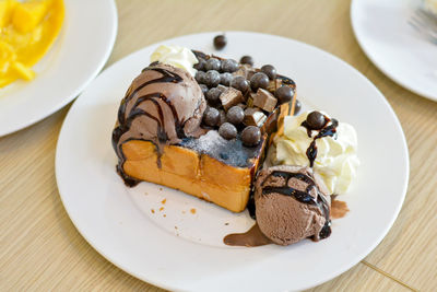 High angle view of cake in plate on table