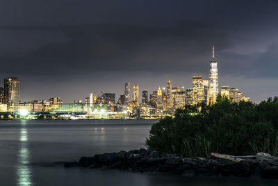 New york city skyline at night. view from hudson river, new york, usa, america.