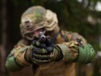 National guard soldier shoots a gun