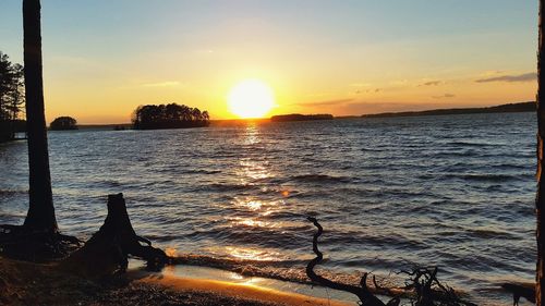 Scenic view of sea at sunset