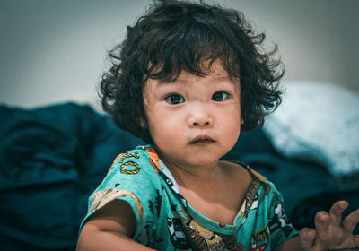 Portrait of cute baby at home