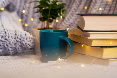 Close-up of books on table at home