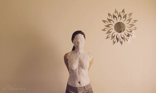 Digital composite image of man against gray background