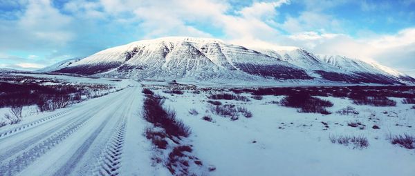 Snow covered mountain against sky