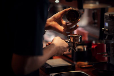 Man preparing food in coffee