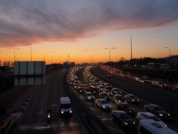 High angle view of traffic on road at sunset