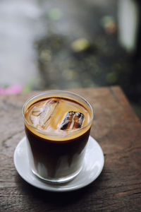 Close-up of iced coffee on table