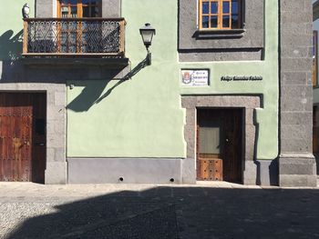 Street light against building