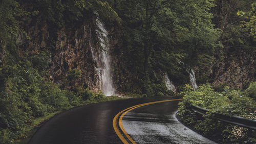 Waterfalls on mountain by road