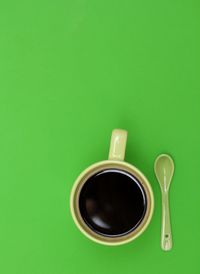 Directly above shot of coffee cup on table