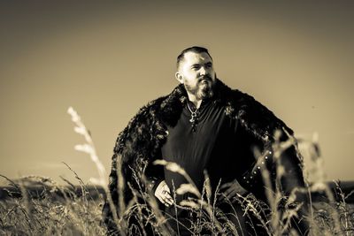 Portrait of a grass in field