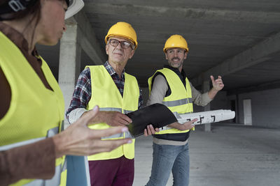 Team of architects working at construction site