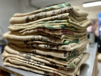 Stack of jute clothes on table