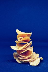 Close-up of bread against blue background