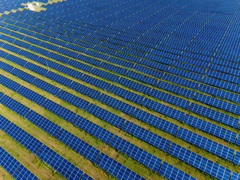 Group of workers solar panels during the day in summer