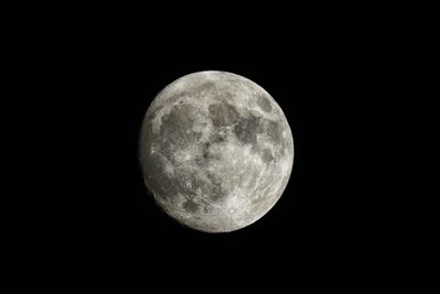 Close-up of moon against clear sky at night