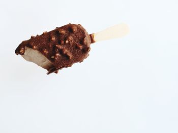 Close-up of chocolate cake against white background