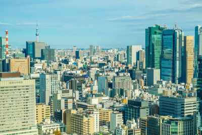 Modern buildings in city against sky