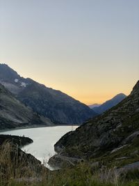 Scenic view of mountains against sky during sunset