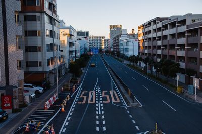 High angle view of roads amidst buildings