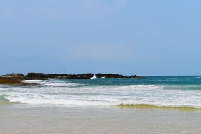 Scenic view of sea against clear sky