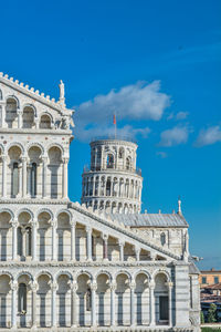 Low angle view of historical building against blue sky