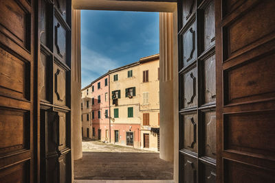 Buildings in city against sky