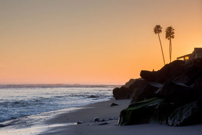 Scenic view of sea at sunset