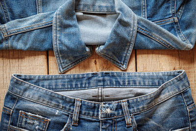 Close-up of denim clothing on table