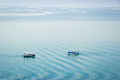 High angle view of nautical vessel on sea against sky