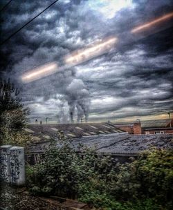 Scenic view of landscape against cloudy sky