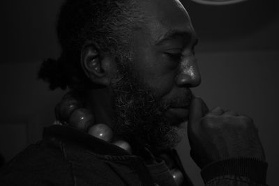 Close-up portrait of man looking away