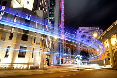 Light trails on city street at night