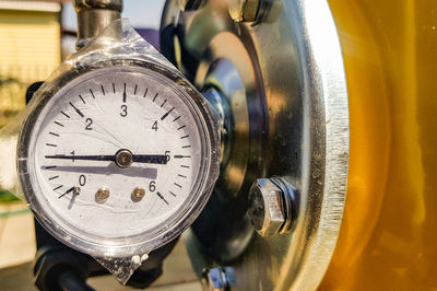Close-up of a pressure gauge for measuring installed in water or gas supply systems. plumbing 