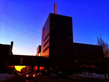 Low angle view of buildings against blue sky