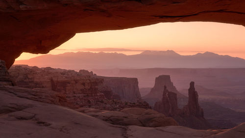 Scenic view of mountains against sky during sunset