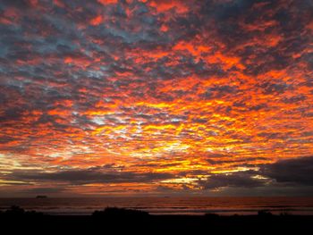 Silhouette of cloudy sky at sunset