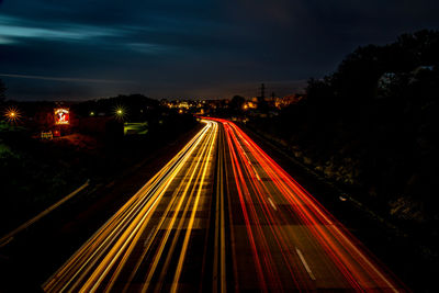 Light trails on road at night