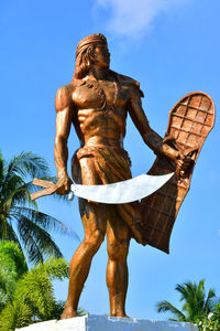 Low angle view of statue against clear sky