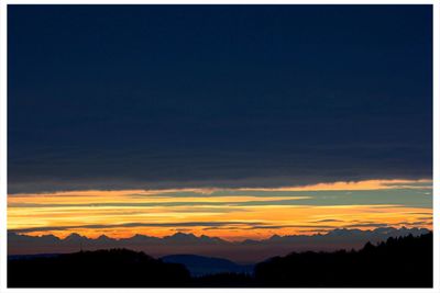 Silhouette of mountain at sunset