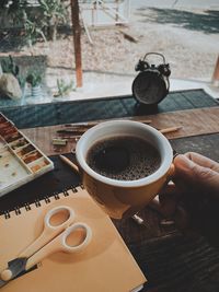 High angle view of coffee cup on table