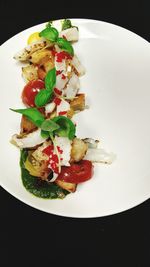 Close-up of served food in plate