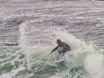 Man surfing in sea