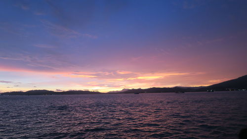 Scenic shot of calm sea at sunset