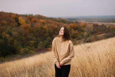 Woman standing on field